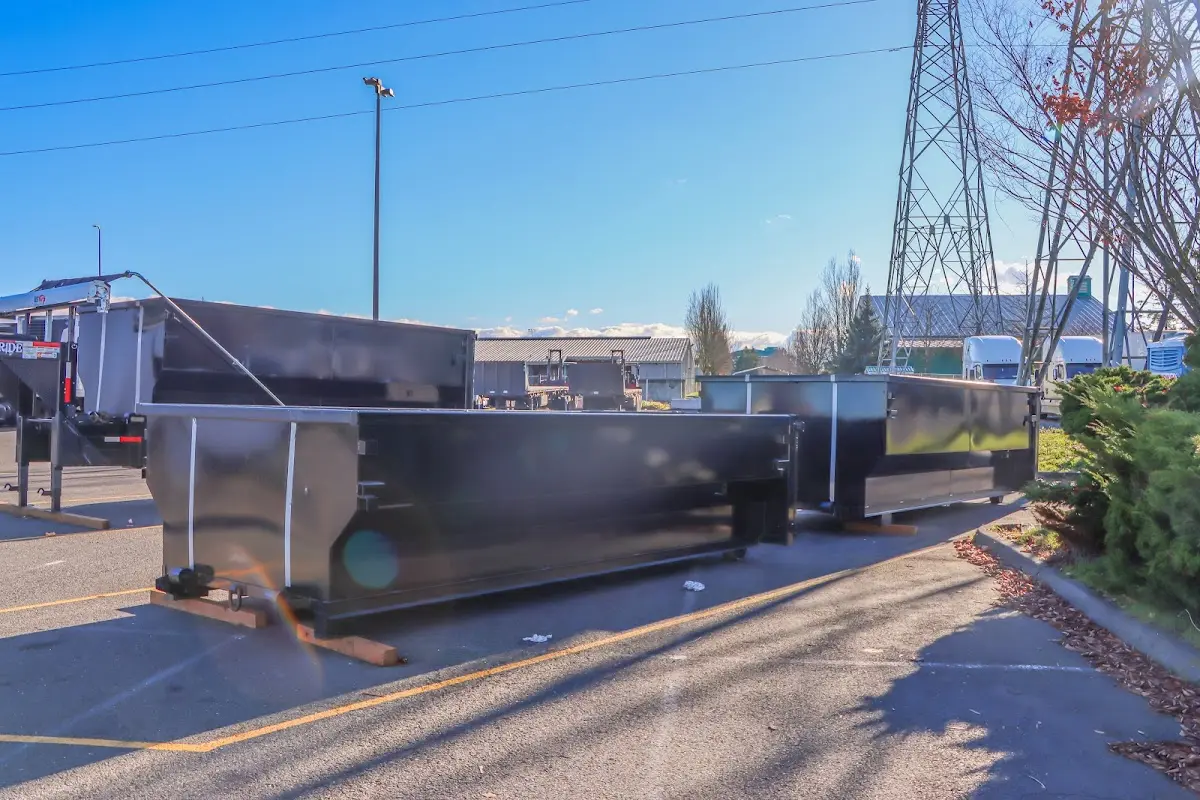 Roll-off dumpster ready for waste disposal at job site for Demolition Dumpster Rental in Walnut Park